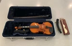 Gently Used Strobel MA-100-13" Viola W/ Hard Case, Bow, Rosin, & Shoulder Rests Open. Price: $500.00.